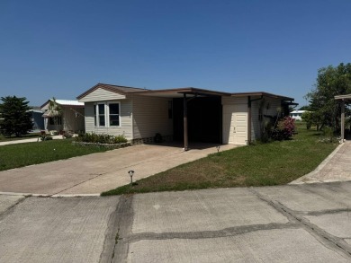 Here's a little slice a peace and happiness! Located on a on Golden Lakes Golf Course in Florida - for sale on GolfHomes.com, golf home, golf lot