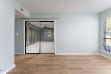 Welcome to this updated 2-bedroom, 2-bathroom ground floor condo on Belvedere Country Club in North Carolina - for sale on GolfHomes.com, golf home, golf lot