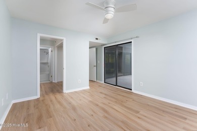 Welcome to this updated 2-bedroom, 2-bathroom ground floor condo on Belvedere Country Club in North Carolina - for sale on GolfHomes.com, golf home, golf lot