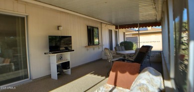 This lovely home in 55 and older community with back yard on PalmBrook Country Club in Arizona - for sale on GolfHomes.com, golf home, golf lot