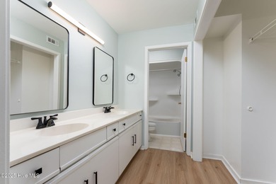 Welcome to this updated 2-bedroom, 2-bathroom ground floor condo on Belvedere Country Club in North Carolina - for sale on GolfHomes.com, golf home, golf lot