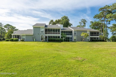 Welcome to this updated 2-bedroom, 2-bathroom ground floor condo on Belvedere Country Club in North Carolina - for sale on GolfHomes.com, golf home, golf lot