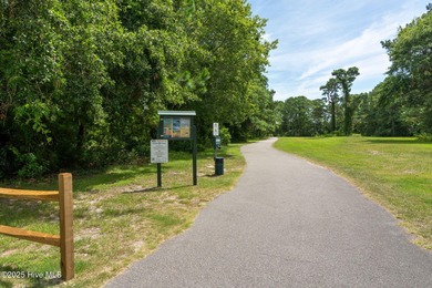 Welcome to this updated 2-bedroom, 2-bathroom ground floor condo on Belvedere Country Club in North Carolina - for sale on GolfHomes.com, golf home, golf lot