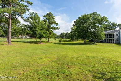 Welcome to this updated 2-bedroom, 2-bathroom ground floor condo on Belvedere Country Club in North Carolina - for sale on GolfHomes.com, golf home, golf lot
