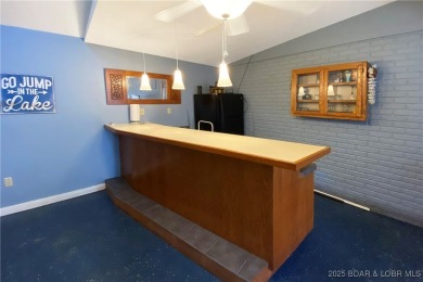 Where do you find a remodeled 2800 s.f. Waterfront Home, 1450 s on The Club At Porto Cima in Missouri - for sale on GolfHomes.com, golf home, golf lot