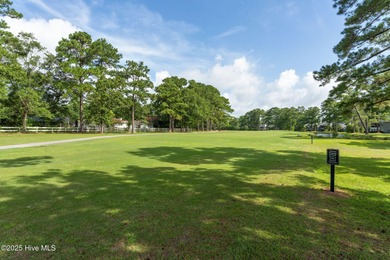 Welcome to this updated 2-bedroom, 2-bathroom ground floor condo on Belvedere Country Club in North Carolina - for sale on GolfHomes.com, golf home, golf lot