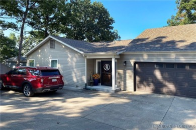 Where do you find a remodeled 2800 s.f. Waterfront Home, 1450 s on The Club At Porto Cima in Missouri - for sale on GolfHomes.com, golf home, golf lot