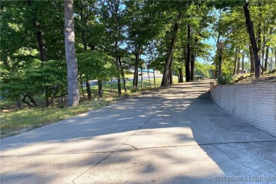 Where do you find a remodeled 2800 s.f. Waterfront Home, 1450 s on The Club At Porto Cima in Missouri - for sale on GolfHomes.com, golf home, golf lot