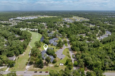 Welcome to this updated 2-bedroom, 2-bathroom ground floor condo on Belvedere Country Club in North Carolina - for sale on GolfHomes.com, golf home, golf lot
