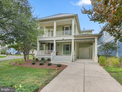 Welcome to 27444 S. Nicklaus Avenue, a refined coastal retreat on The Peninsula Golf and Country Club in Delaware - for sale on GolfHomes.com, golf home, golf lot