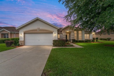 Spacious and thoughtfully designed, this popular Sanibel model on Eagle Ridge At Spruce Creek Country Club in Florida - for sale on GolfHomes.com, golf home, golf lot