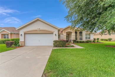 Spacious and thoughtfully designed, this popular Sanibel model on Eagle Ridge At Spruce Creek Country Club in Florida - for sale on GolfHomes.com, golf home, golf lot