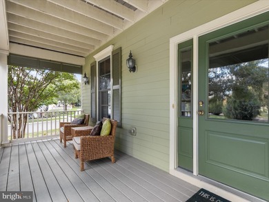 Welcome to 27444 S. Nicklaus Avenue, a refined coastal retreat on The Peninsula Golf and Country Club in Delaware - for sale on GolfHomes.com, golf home, golf lot