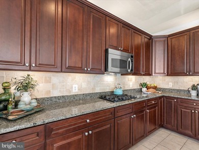 Welcome to 27444 S. Nicklaus Avenue, a refined coastal retreat on The Peninsula Golf and Country Club in Delaware - for sale on GolfHomes.com, golf home, golf lot