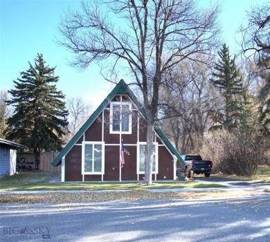 LITTLE PIECE OF MONTANA PARADISE RIGHT IN TOWN. This A frame is on Headwaters Golf Course in Montana - for sale on GolfHomes.com, golf home, golf lot