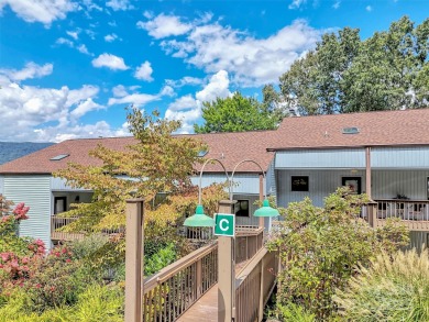 Discover comfort & style in this spacious bottom-level condo on Waynesville Country Club Inn in North Carolina - for sale on GolfHomes.com, golf home, golf lot