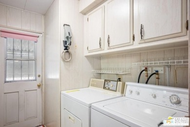 2bed/2bath 1440 sq ft home nestled on an oversized lot with on Date Palm Country Club in California - for sale on GolfHomes.com, golf home, golf lot