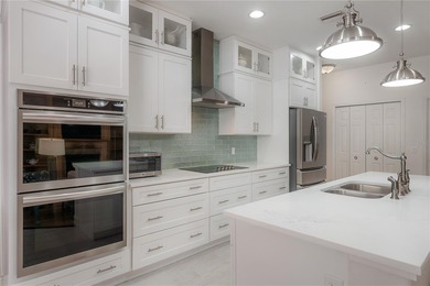 Welcome home to a place where comfort, craftsmanship, and calm on Temple Terrace Golf and Country Club in Florida - for sale on GolfHomes.com, golf home, golf lot