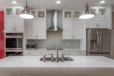 Welcome home to a place where comfort, craftsmanship, and calm on Temple Terrace Golf and Country Club in Florida - for sale on GolfHomes.com, golf home, golf lot