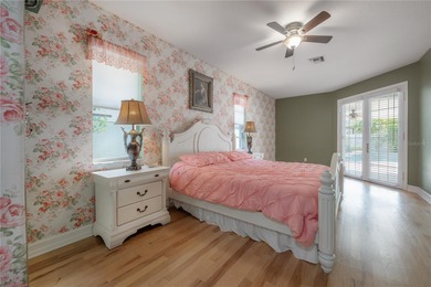 Welcome home to a place where comfort, craftsmanship, and calm on Temple Terrace Golf and Country Club in Florida - for sale on GolfHomes.com, golf home, golf lot