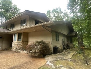 This Frank Lloyd Wright designed home has a large open floor on  in Tennessee - for sale on GolfHomes.com, golf home, golf lot