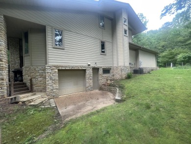 This Frank Lloyd Wright designed home has a large open floor on  in Tennessee - for sale on GolfHomes.com, golf home, golf lot