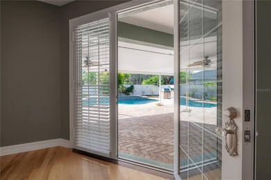 Welcome home to a place where comfort, craftsmanship, and calm on Temple Terrace Golf and Country Club in Florida - for sale on GolfHomes.com, golf home, golf lot