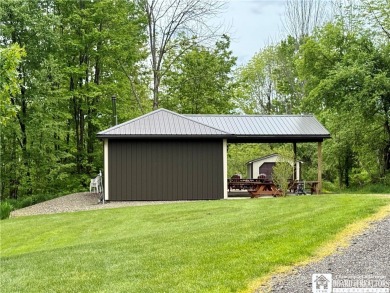 Step into resort living at its finest with this well maintained on Peek n Peek Golf Course - Lower in New York - for sale on GolfHomes.com, golf home, golf lot