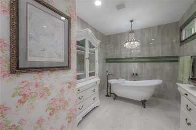 Welcome home to a place where comfort, craftsmanship, and calm on Temple Terrace Golf and Country Club in Florida - for sale on GolfHomes.com, golf home, golf lot