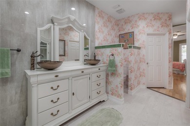 Welcome home to a place where comfort, craftsmanship, and calm on Temple Terrace Golf and Country Club in Florida - for sale on GolfHomes.com, golf home, golf lot