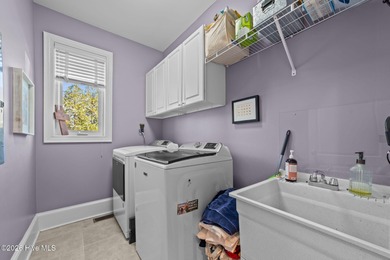 Welcome to this exceptional custom home located in Cypress on Cypress Landing Golf Club in North Carolina - for sale on GolfHomes.com, golf home, golf lot