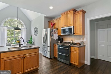 Primary Suite AND Second Bedroom on Main Level! Open Concept on Creekside Golf and Country Club in Georgia - for sale on GolfHomes.com, golf home, golf lot