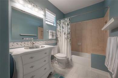 Welcome home to a place where comfort, craftsmanship, and calm on Temple Terrace Golf and Country Club in Florida - for sale on GolfHomes.com, golf home, golf lot