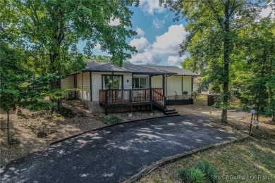 Charming, Fully Updated Home in Tan-Tar-A Estates -Just Minutes on The Oaks Golf Course in Missouri - for sale on GolfHomes.com, golf home, golf lot