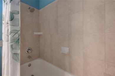 Welcome home to a place where comfort, craftsmanship, and calm on Temple Terrace Golf and Country Club in Florida - for sale on GolfHomes.com, golf home, golf lot