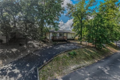 Charming, Fully Updated Home in Tan-Tar-A Estates -Just Minutes on The Oaks Golf Course in Missouri - for sale on GolfHomes.com, golf home, golf lot