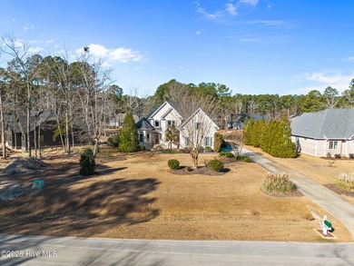 Welcome to this exceptional custom home located in Cypress on Cypress Landing Golf Club in North Carolina - for sale on GolfHomes.com, golf home, golf lot