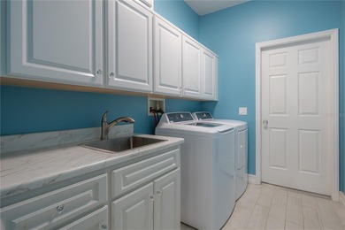 Welcome home to a place where comfort, craftsmanship, and calm on Temple Terrace Golf and Country Club in Florida - for sale on GolfHomes.com, golf home, golf lot