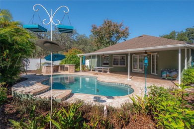 Welcome home to a place where comfort, craftsmanship, and calm on Temple Terrace Golf and Country Club in Florida - for sale on GolfHomes.com, golf home, golf lot