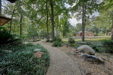 Welcome to your serene retreat in the beautiful, gated community on Hide-A-Way Lake Golf Course in Texas - for sale on GolfHomes.com, golf home, golf lot