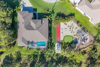 A Home Designed for Living, Entertaining, and Making Memories in on Rotonda Golf and Country Club - Long Marsh  in Florida - for sale on GolfHomes.com, golf home, golf lot