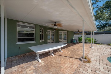 Welcome home to a place where comfort, craftsmanship, and calm on Temple Terrace Golf and Country Club in Florida - for sale on GolfHomes.com, golf home, golf lot