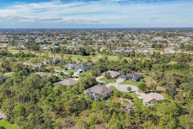 A Home Designed for Living, Entertaining, and Making Memories in on Rotonda Golf and Country Club - Long Marsh  in Florida - for sale on GolfHomes.com, golf home, golf lot