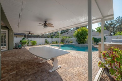 Welcome home to a place where comfort, craftsmanship, and calm on Temple Terrace Golf and Country Club in Florida - for sale on GolfHomes.com, golf home, golf lot