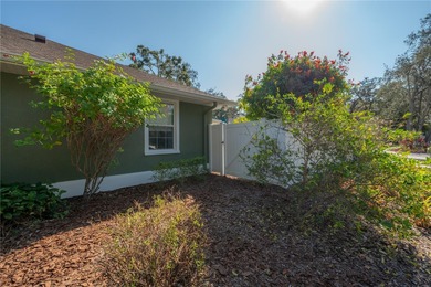 Welcome home to a place where comfort, craftsmanship, and calm on Temple Terrace Golf and Country Club in Florida - for sale on GolfHomes.com, golf home, golf lot