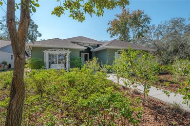 Welcome home to a place where comfort, craftsmanship, and calm on Temple Terrace Golf and Country Club in Florida - for sale on GolfHomes.com, golf home, golf lot