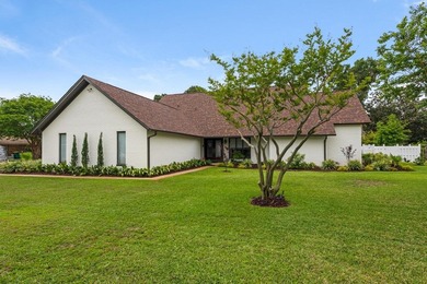 Welcome to 99 Country Club Dr. W, an elegantly updated on Indian Bayou Golf and Country Club in Florida - for sale on GolfHomes.com, golf home, golf lot