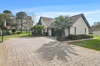 Welcome to 99 Country Club Dr. W, an elegantly updated on Indian Bayou Golf and Country Club in Florida - for sale on GolfHomes.com, golf home, golf lot