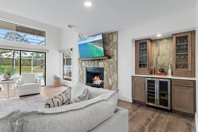 Welcome to 99 Country Club Dr. W, an elegantly updated on Indian Bayou Golf and Country Club in Florida - for sale on GolfHomes.com, golf home, golf lot