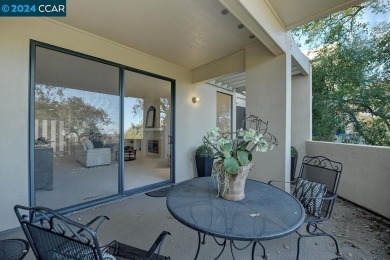 Nestled at the end of the drive, this rare end-unit level-in on Rossmoor Golf Course in California - for sale on GolfHomes.com, golf home, golf lot